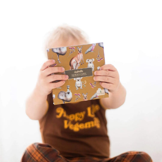 Toddler holding box