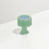 Blue tealight in the Fazeek Wave candle holder