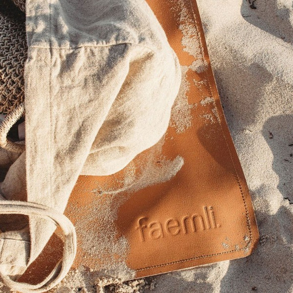 faemli debossed logo close up