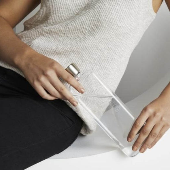 Slim memobottle being held